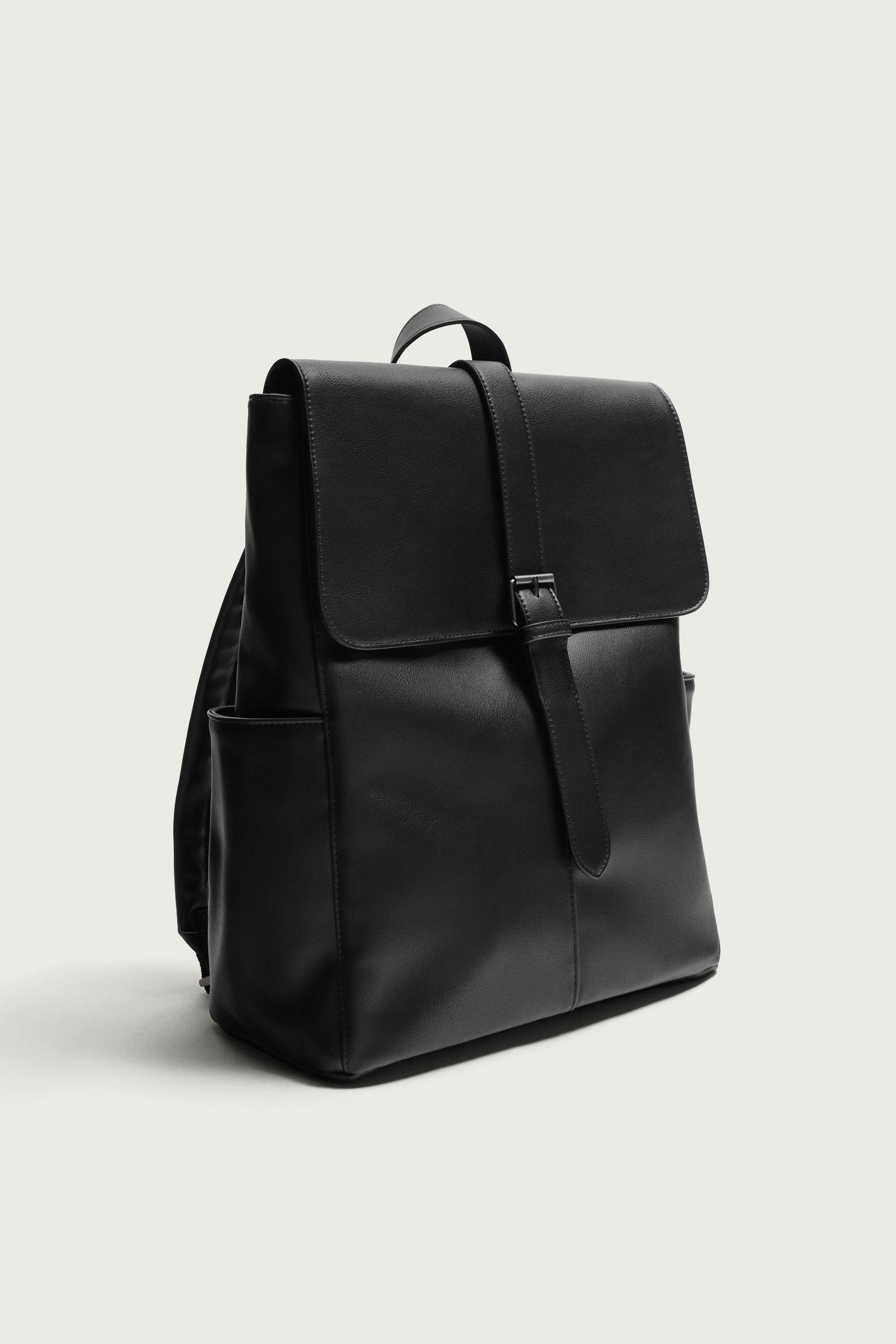 BELTED FLAP BACKPACK